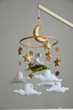 Mobile with astronaut, golden stars and moon, space style - Minidreams Decor
