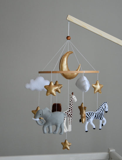 Safari mobile with giraffe, lion, elephant, moon, stars and clouds