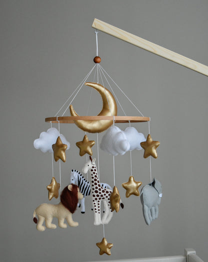 Safari mobile with giraffe, lion, elephant, moon, stars and clouds