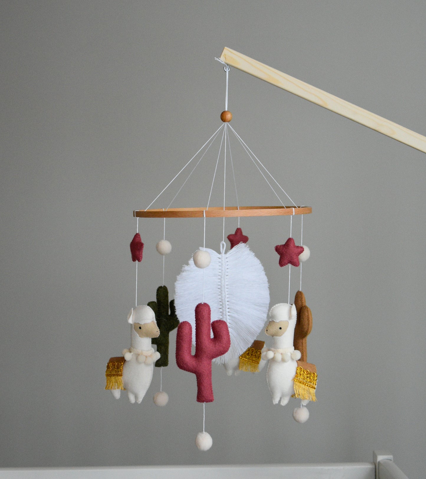 Llama mobile with cactus, felted balls and stars