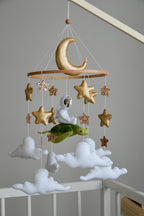 Mobile with astronaut, golden stars and moon, space style - Minidreams Decor