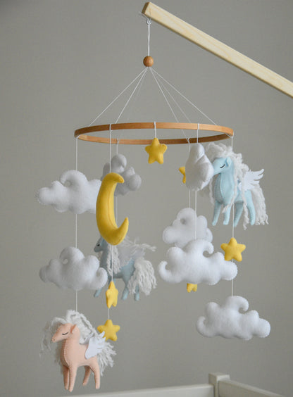 Horse mobile with clouds and pale yellow stars