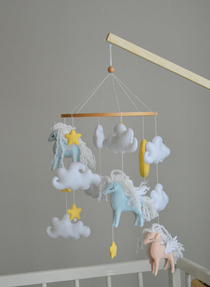 Horse mobile with clouds and pale yellow stars