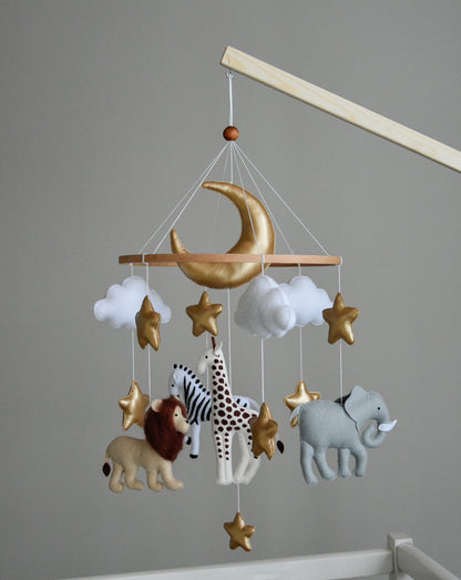 Safari mobile with giraffe, lion, elephant, moon, stars and clouds