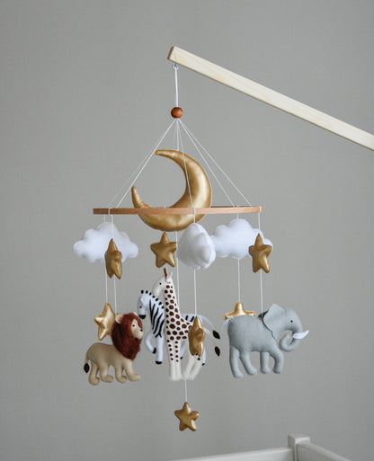 Safari mobile with giraffe, lion, elephant, moon, stars and clouds