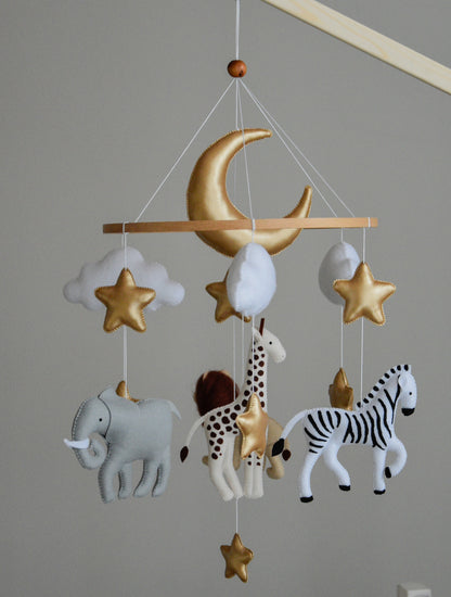 Safari mobile with giraffe, lion, elephant, moon, stars and clouds