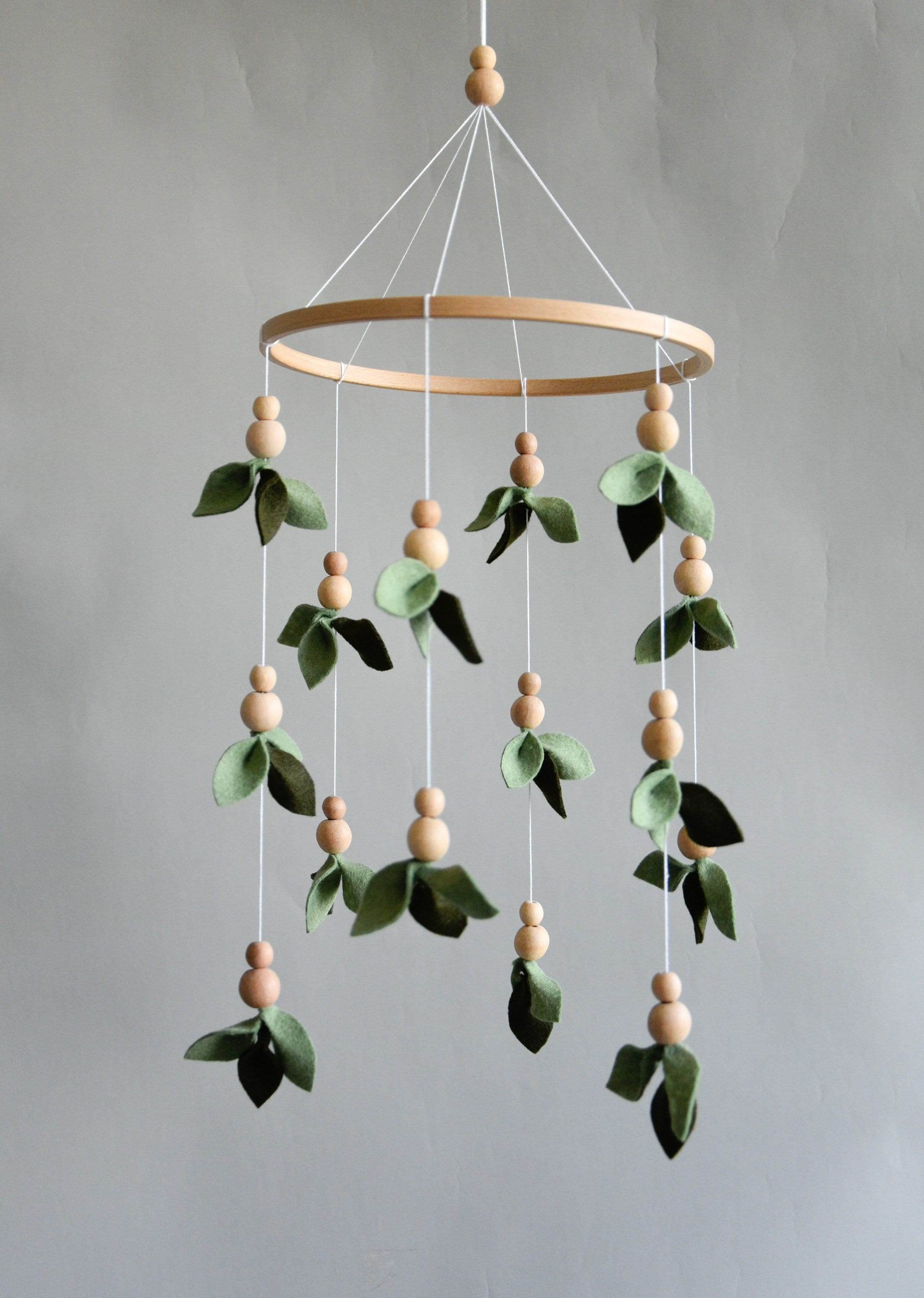 Forest style floral mobile with leaves and wooden pearls - Minidreams Decor