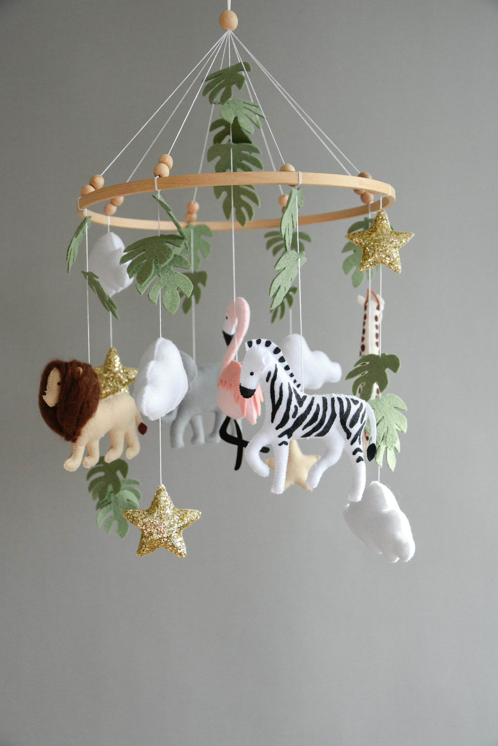 Safari mobile with lion, zebra,, flamingos, elephants, monstera leaves, stars and clouds - Minidreams Decor