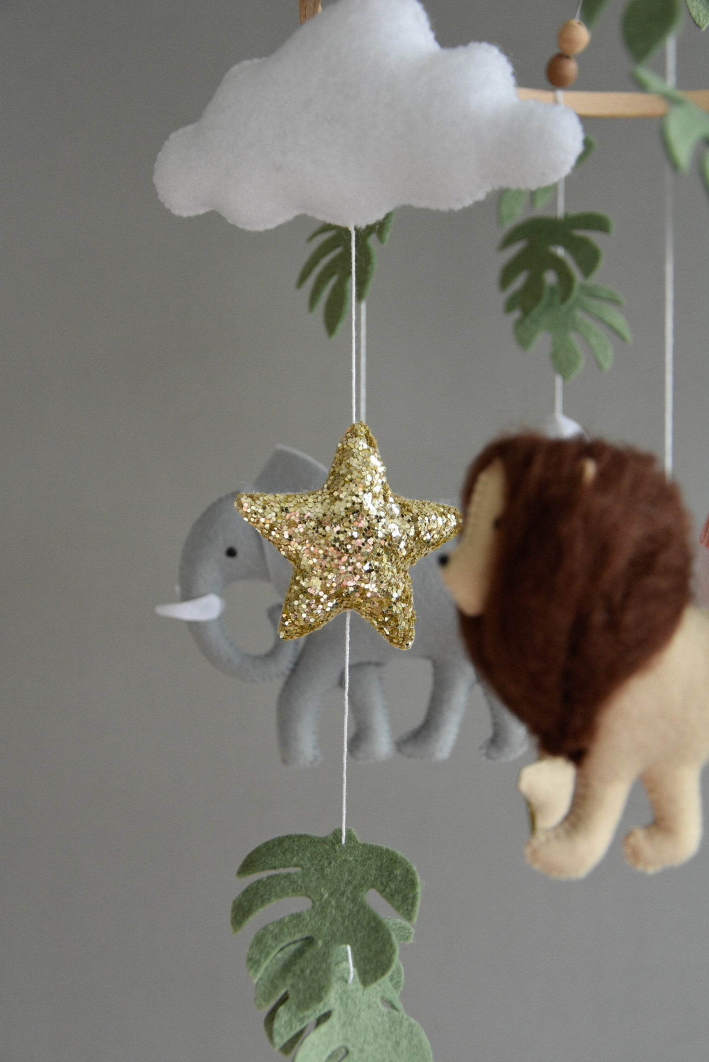 Safari mobile with lion, zebra,, flamingos, elephants, monstera leaves, stars and clouds - Minidreams Decor