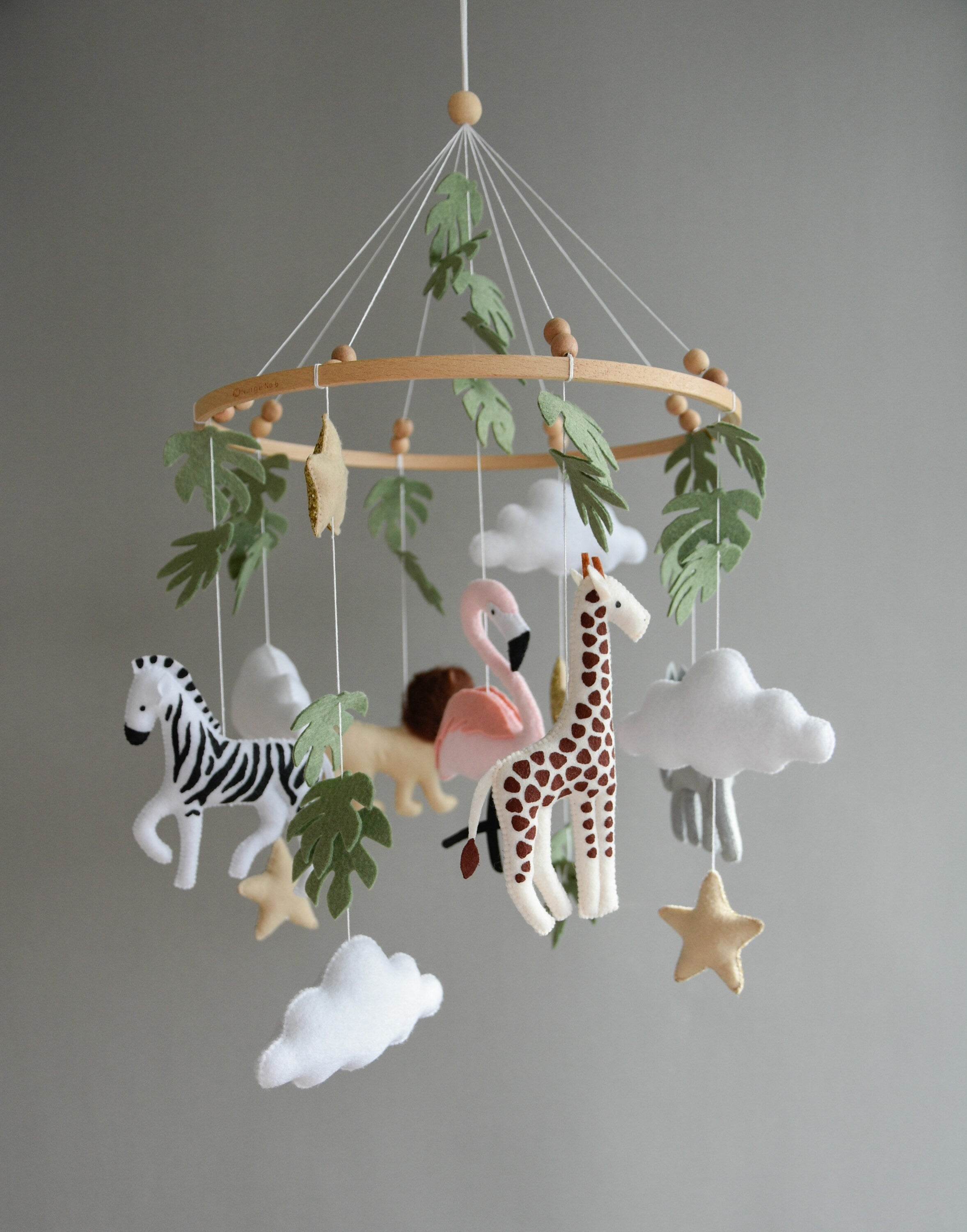 Safari mobile with lion, zebra,, flamingos, elephants, monstera leaves, stars and clouds - Minidreams Decor