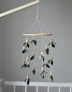 Forest style floral mobile with leaves and wooden pearls - Minidreams Decor