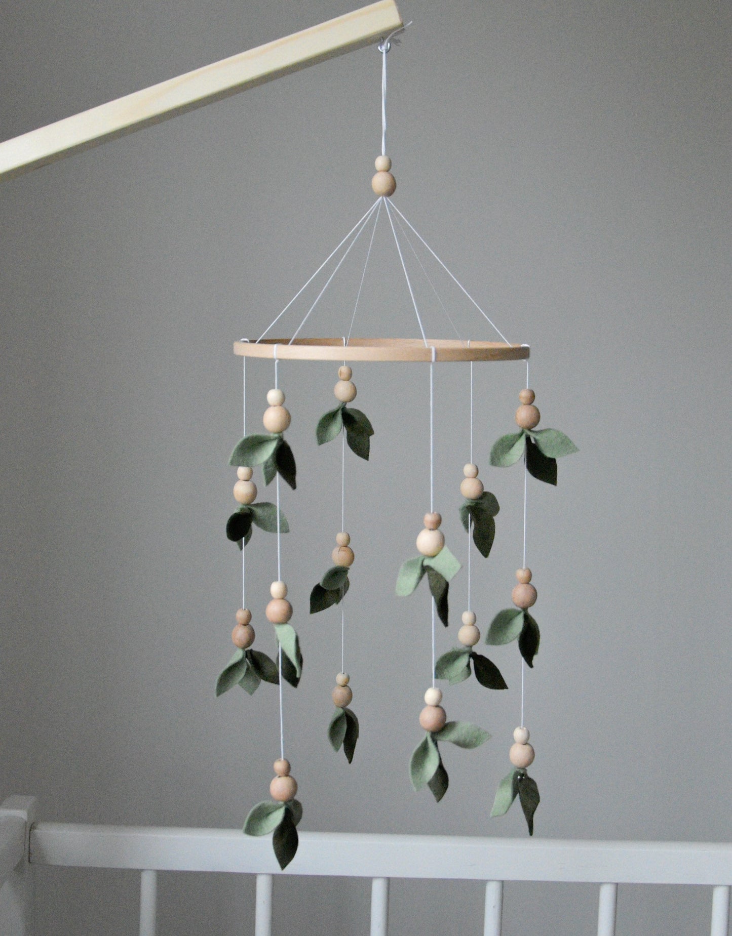 Forest style floral mobile with leaves and wooden pearls