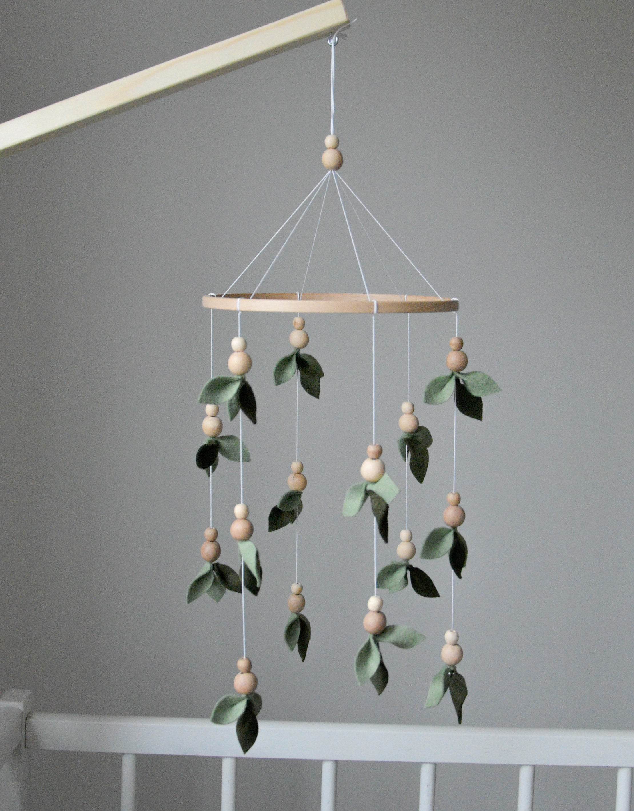 Forest style floral mobile with leaves and wooden pearls - Minidreams Decor
