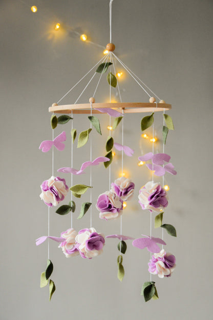 Floral mobile with purple white flower, butterfly and leaves