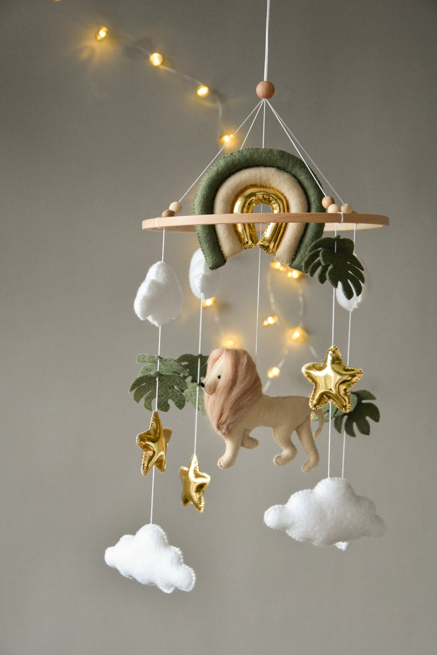 Baby mobile with Lion, golden stars clouds, monstera leaves and rainbow