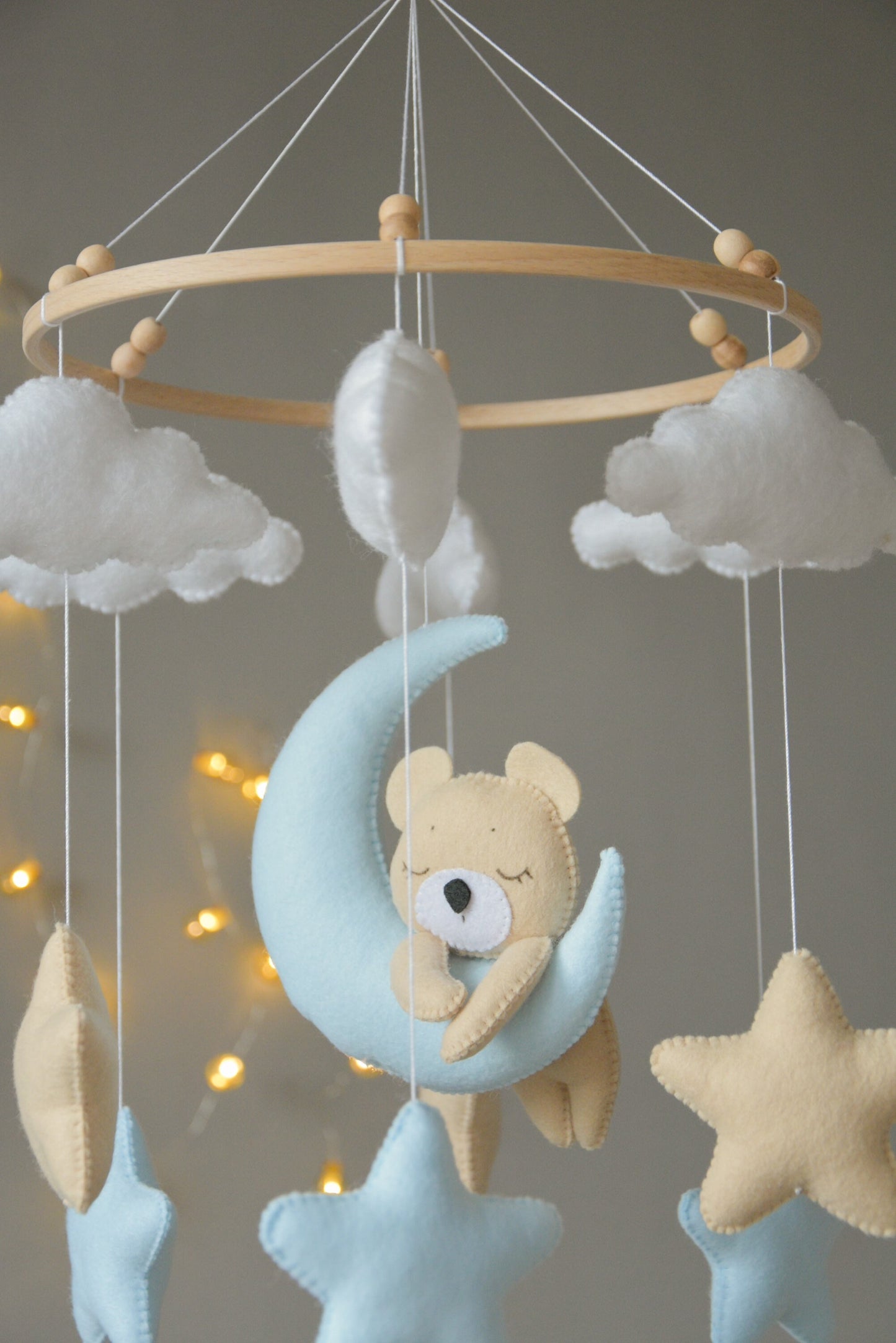 Baby mobile with sleeping/hanging bear, clouds and stars