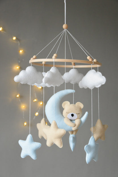 Baby mobile with sleeping/hanging bear, clouds and stars