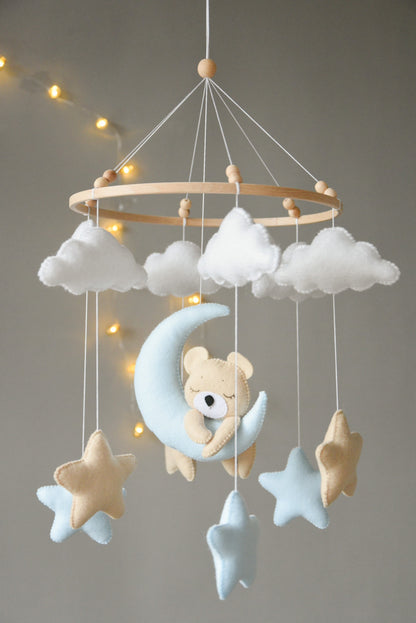 Baby mobile with sleeping/hanging bear, clouds and stars