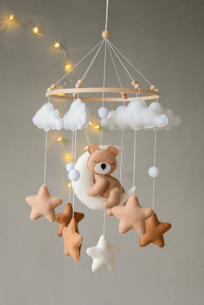 Baby mobile with sleeping bear, moon, stars and clouds