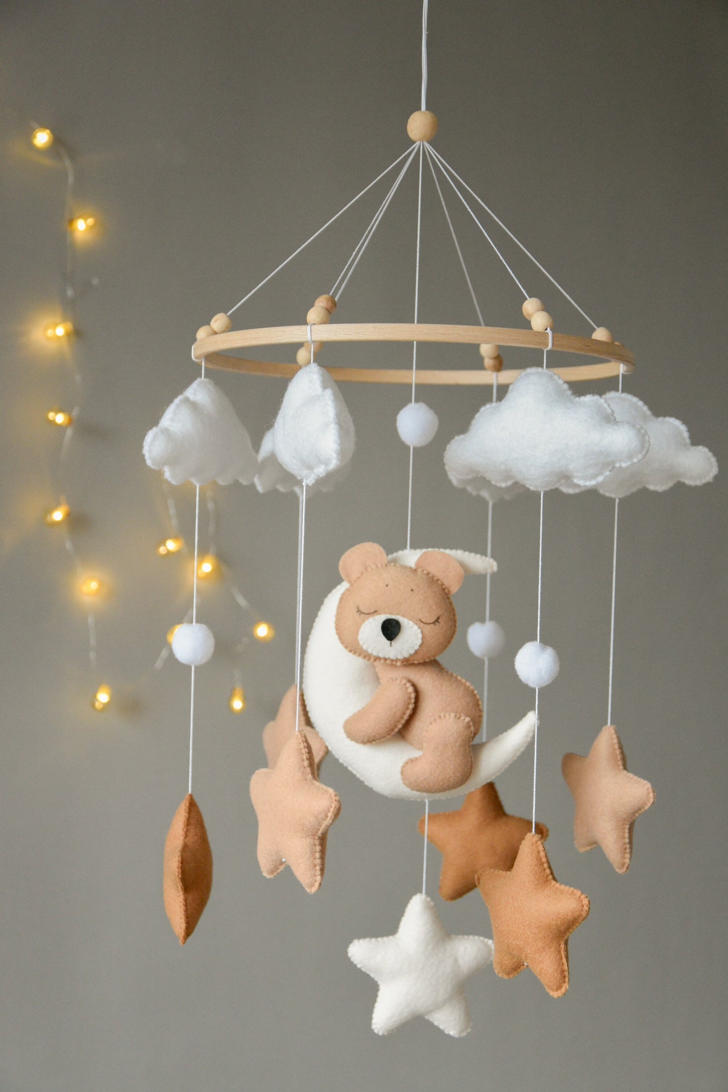 Baby mobile with sleeping bear, moon, stars and clouds