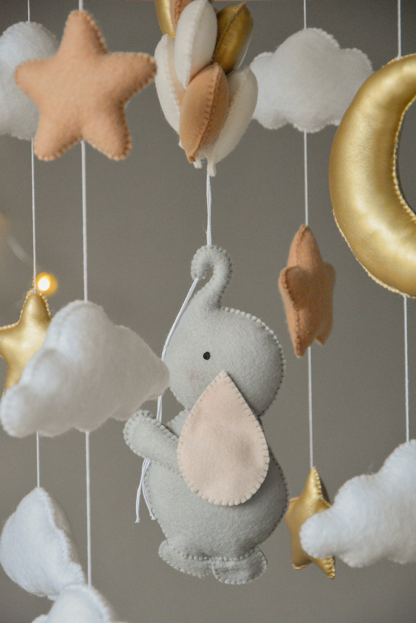 Baby mobile with elephant, moon, clouds and stars