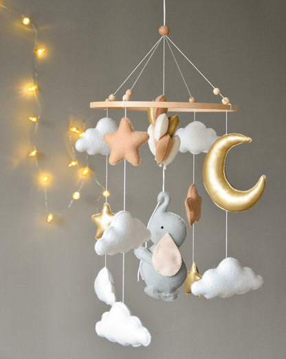 Baby mobile with elephant, moon, clouds and stars