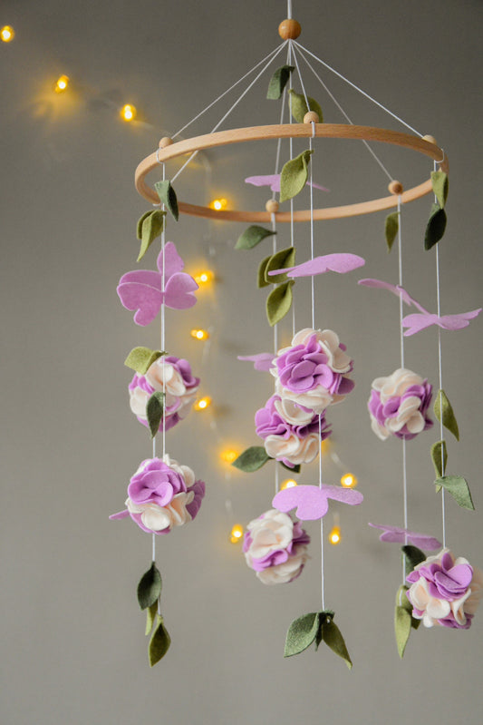 Floral mobile with purple white flower, butterfly and leaves