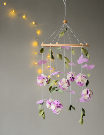 Floral mobile with purple white flower, butterfly and leaves