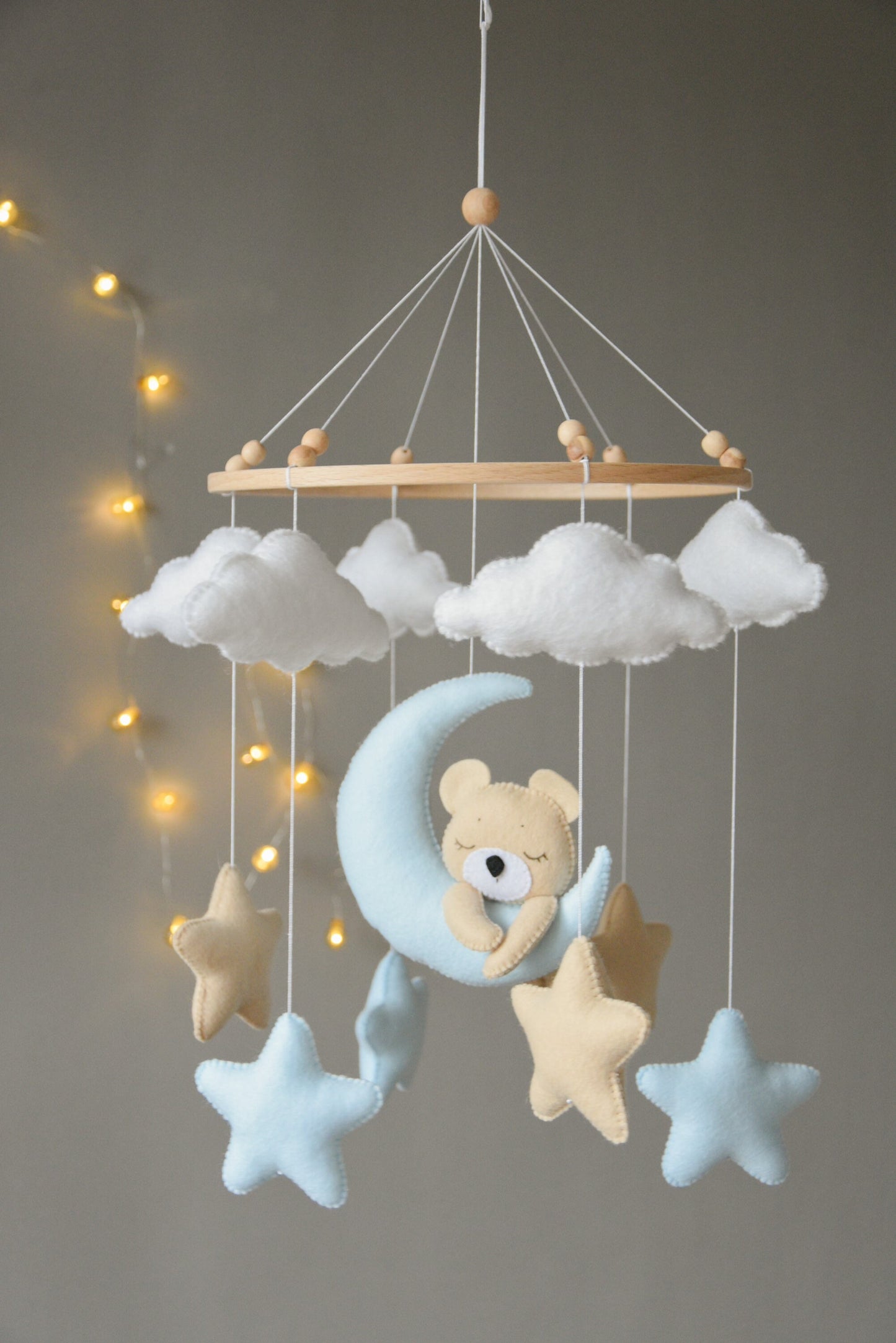 Baby mobile with sleeping/hanging bear, clouds and stars