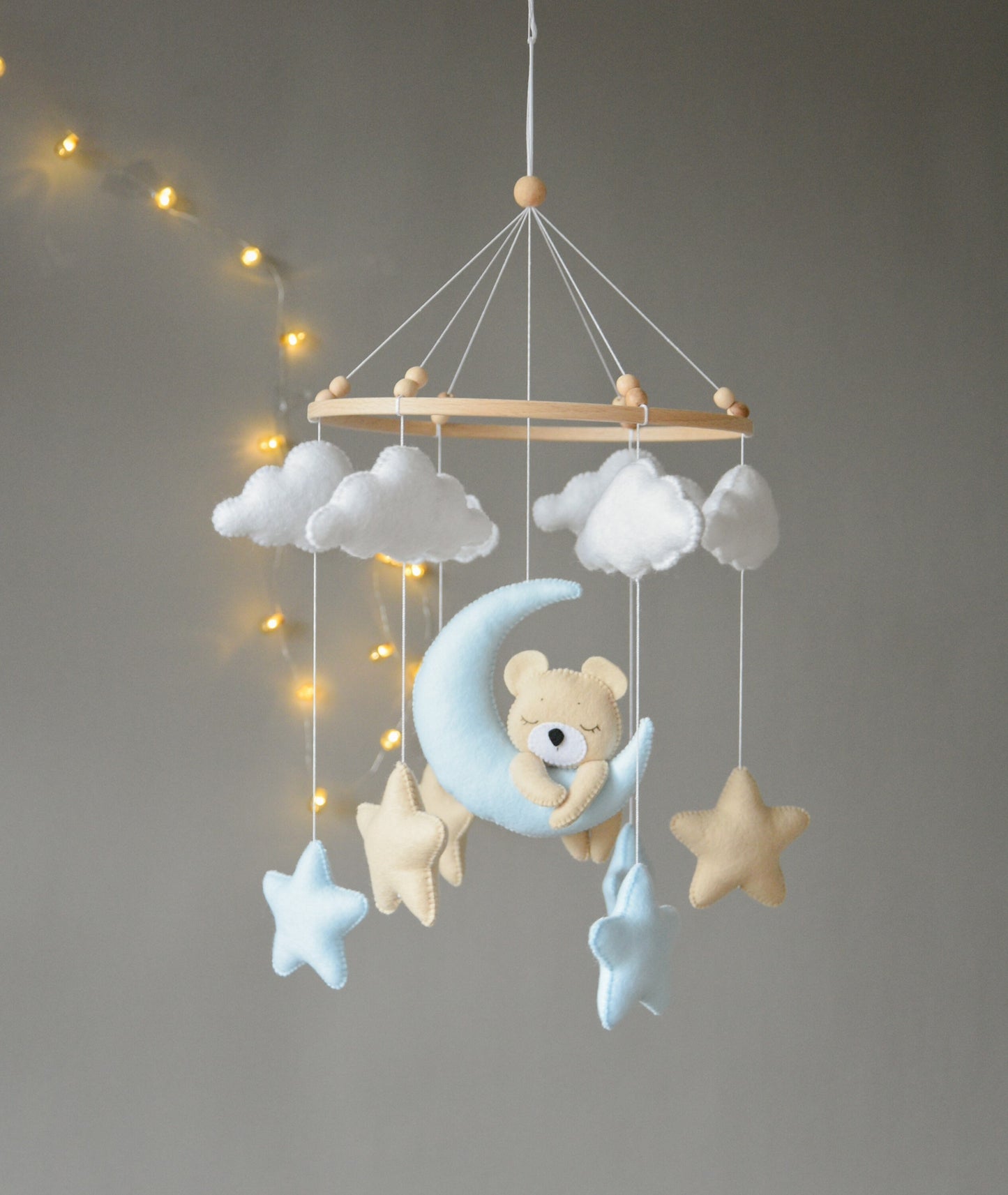 Baby mobile with sleeping/hanging bear, clouds and stars