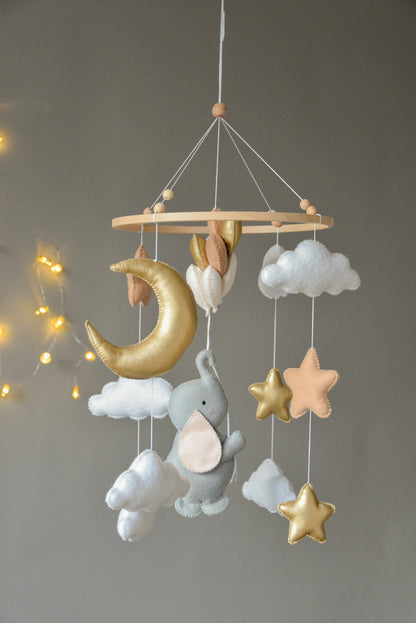 Baby mobile with elephant, moon, clouds and stars