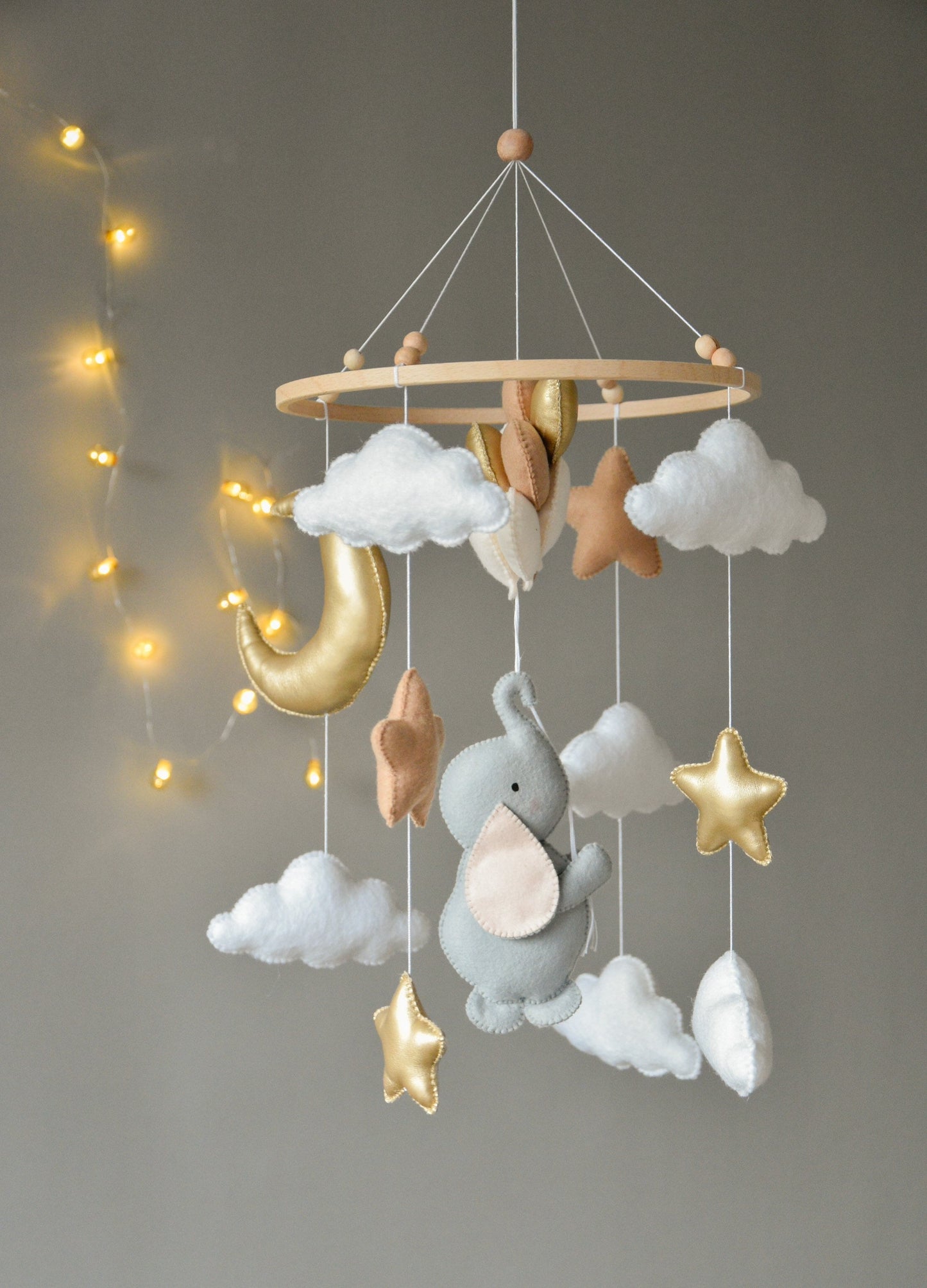 Baby mobile with elephant, moon, clouds and stars