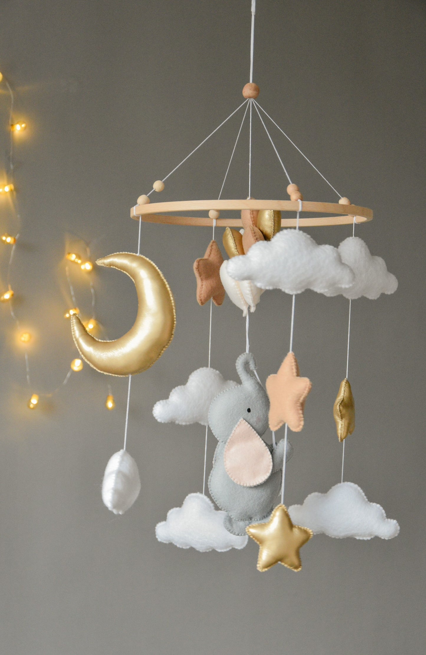 Baby mobile with elephant, moon, clouds and stars