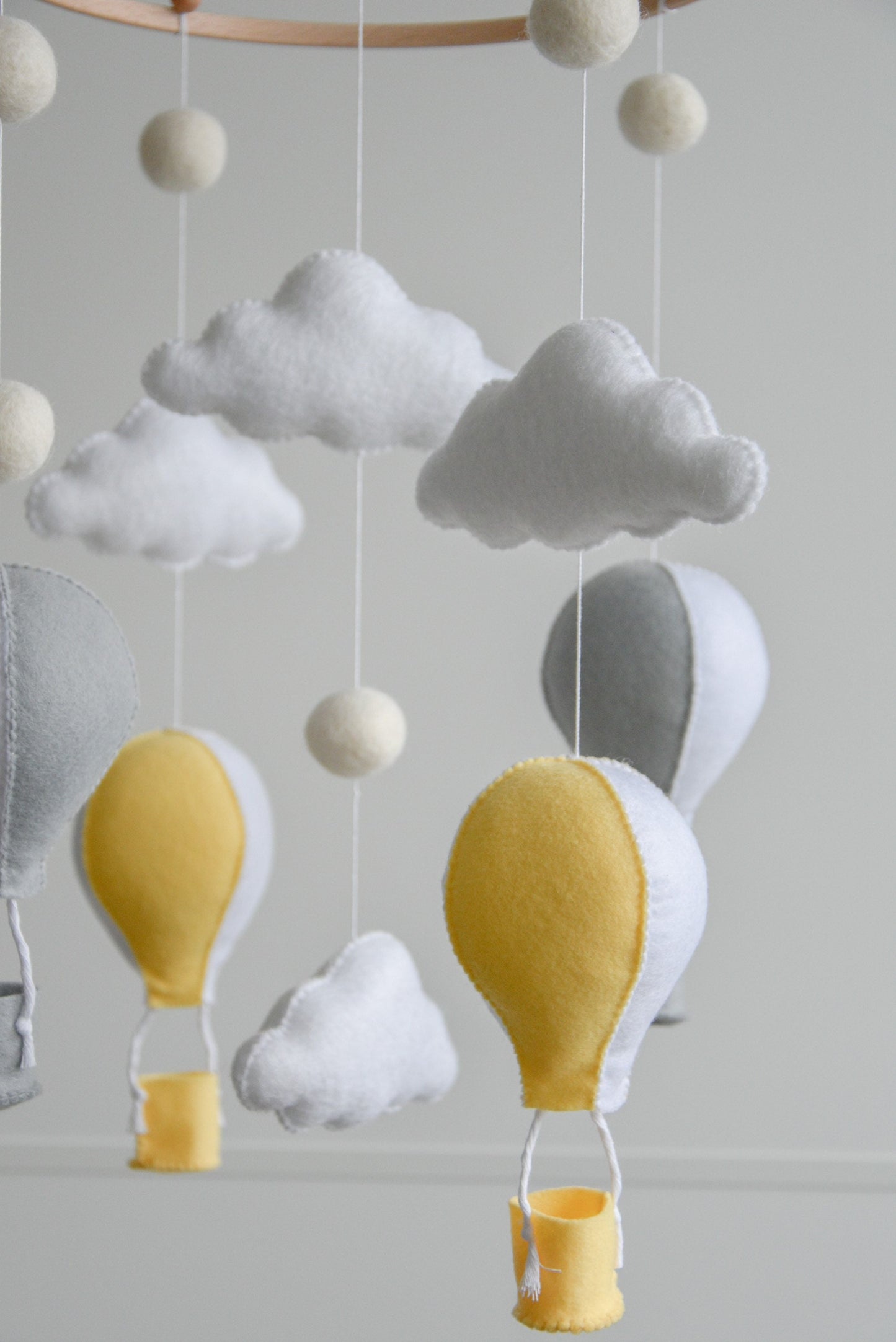 Hot air balloons mobile with felted balls and clouds