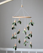 Forest style floral mobile with leaves and wooden pearls - Minidreams Decor