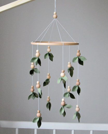 Forest style floral mobile with leaves and wooden pearls