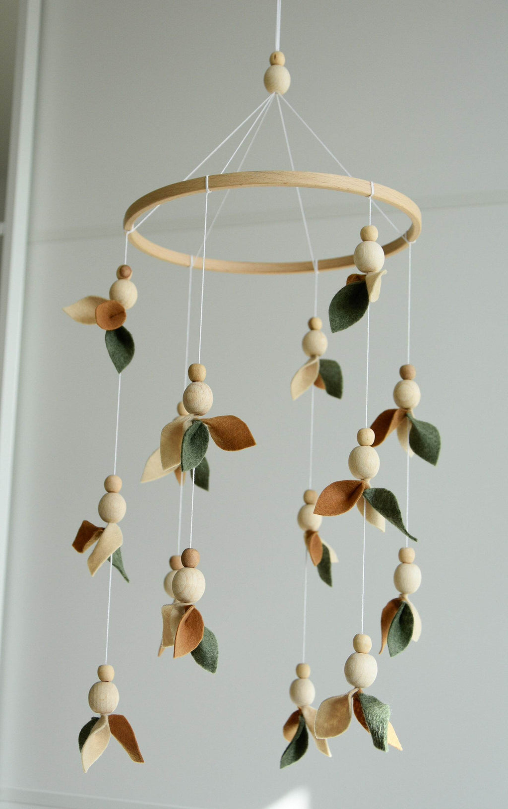Floral mobile with wooden pearls, green, beige, brown and leaves - Minidreams Decor