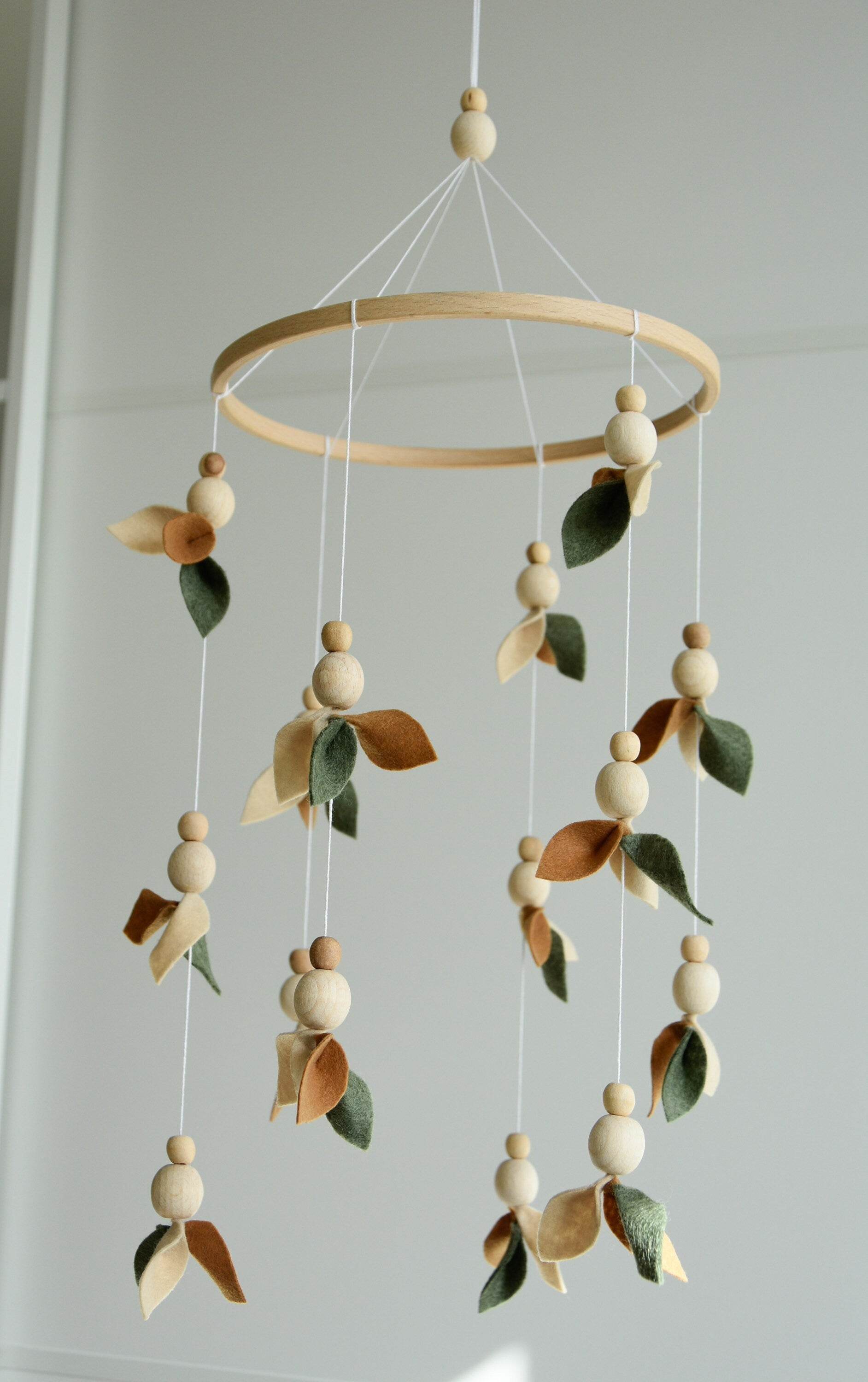 Floral mobile with wooden pearls, green, beige, brown and leaves - Minidreams Decor