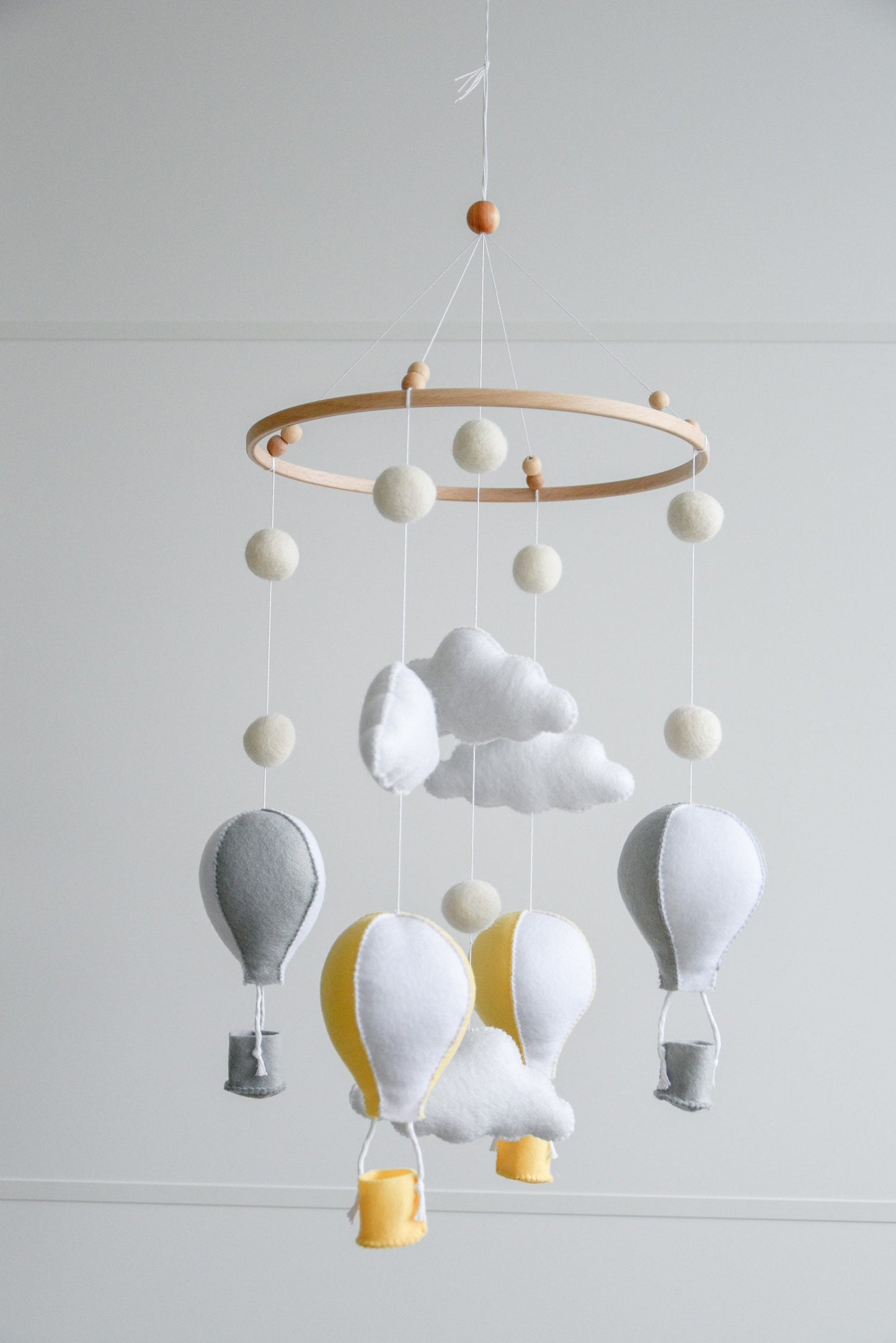 Hot air balloons mobile with felted balls and clouds