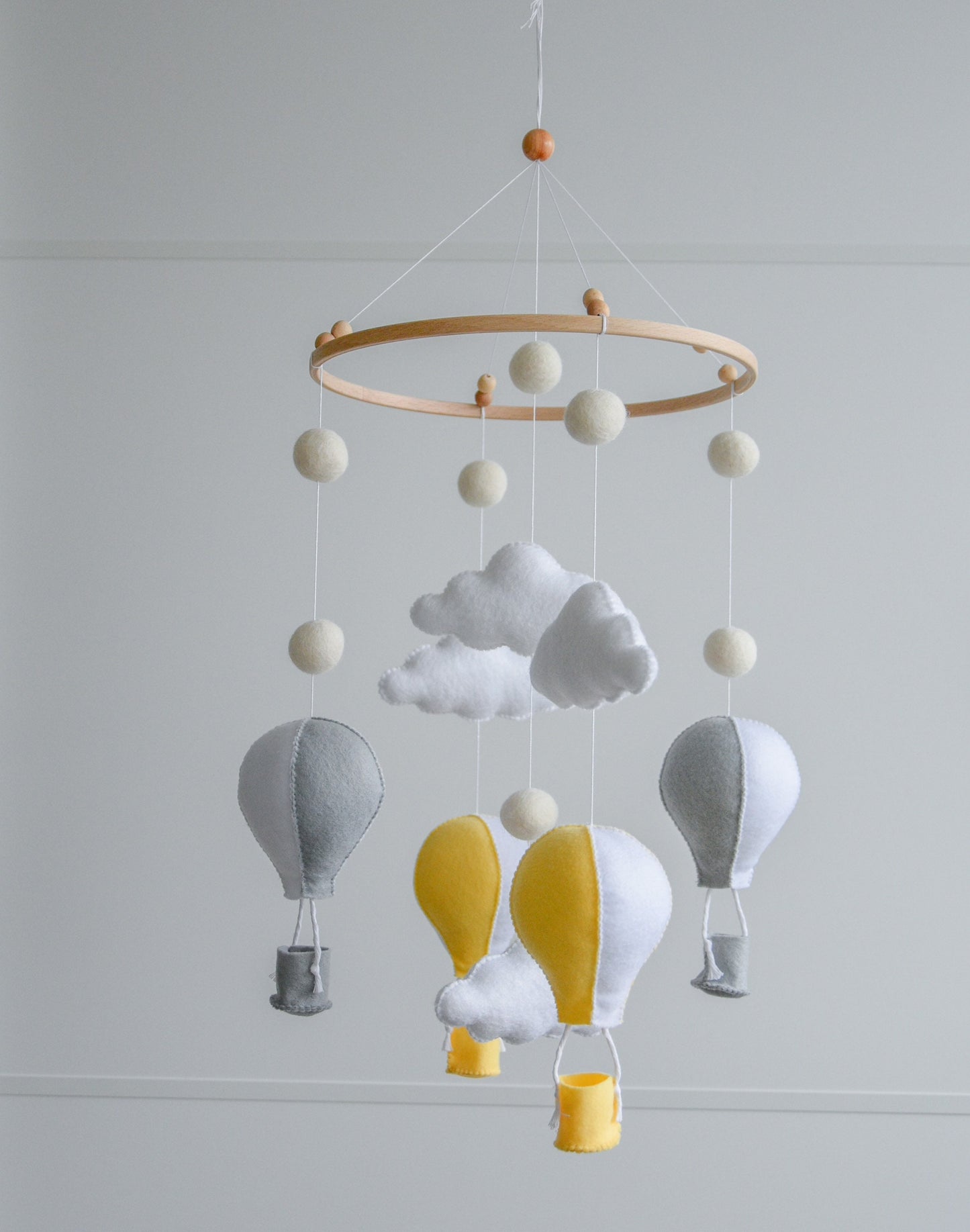 Hot air balloons mobile with felted balls and clouds