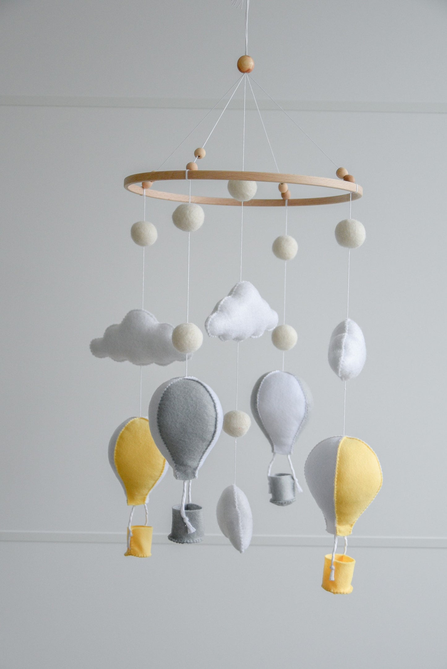 Hot air balloons mobile with felted balls and clouds