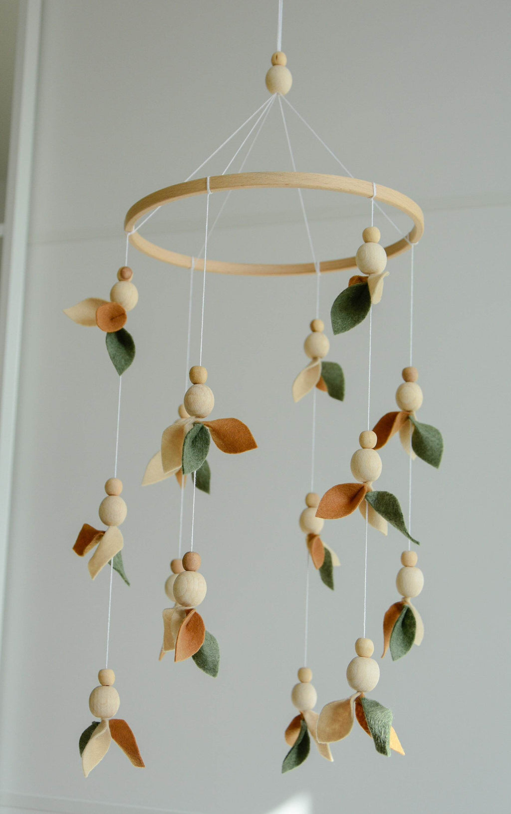 Floral mobile with wooden pearls, green, beige, brown and leaves - Minidreams Decor