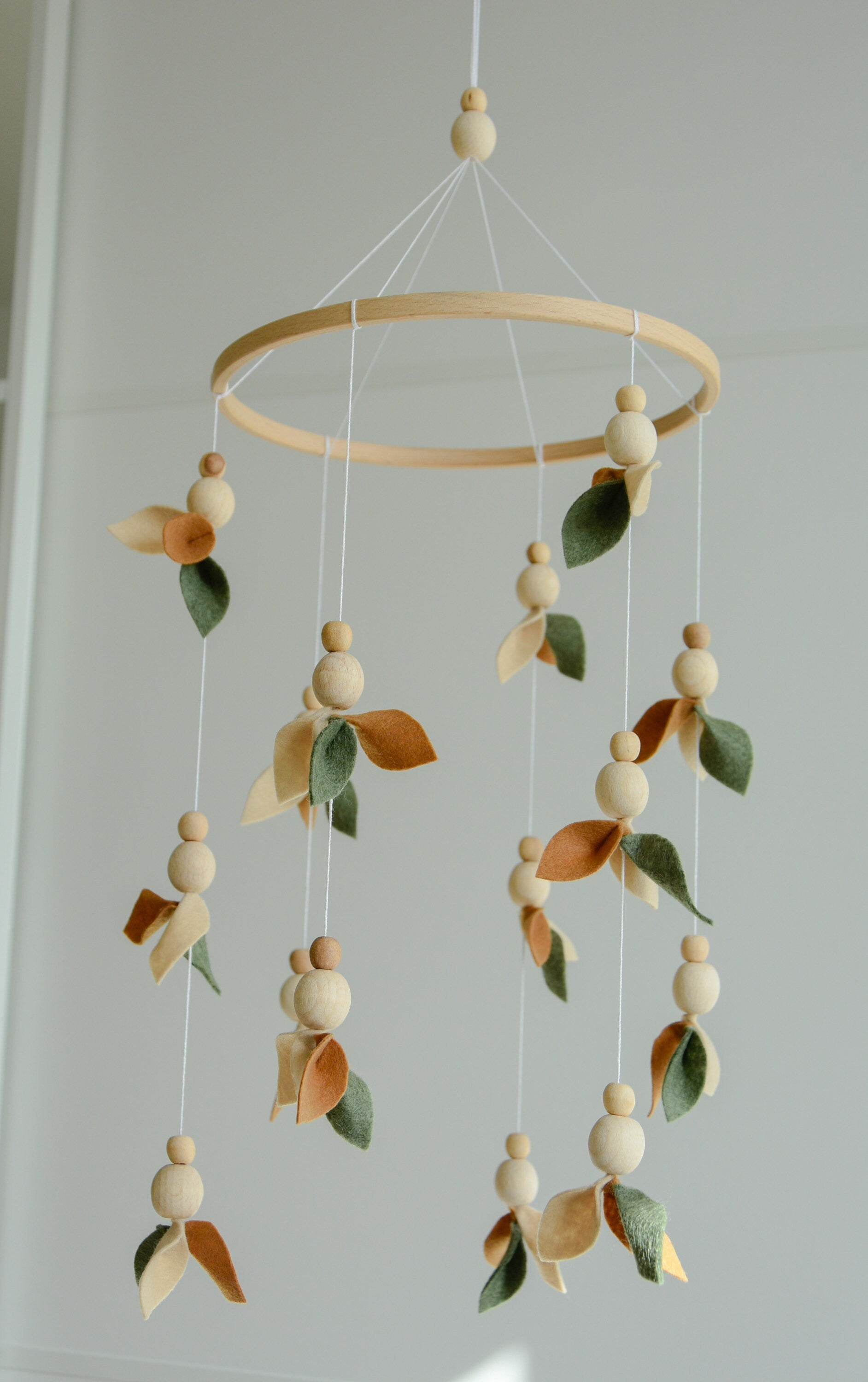 Floral mobile with wooden pearls, green, beige, brown and leaves - Minidreams Decor