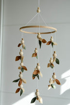 Floral mobile with wooden pearls, green, beige, brown and leaves - Minidreams Decor