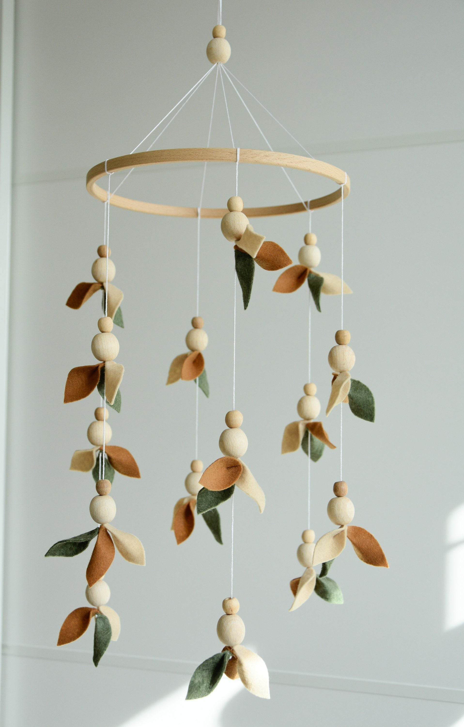 Floral mobile with wooden pearls, green, beige, brown and leaves - Minidreams Decor
