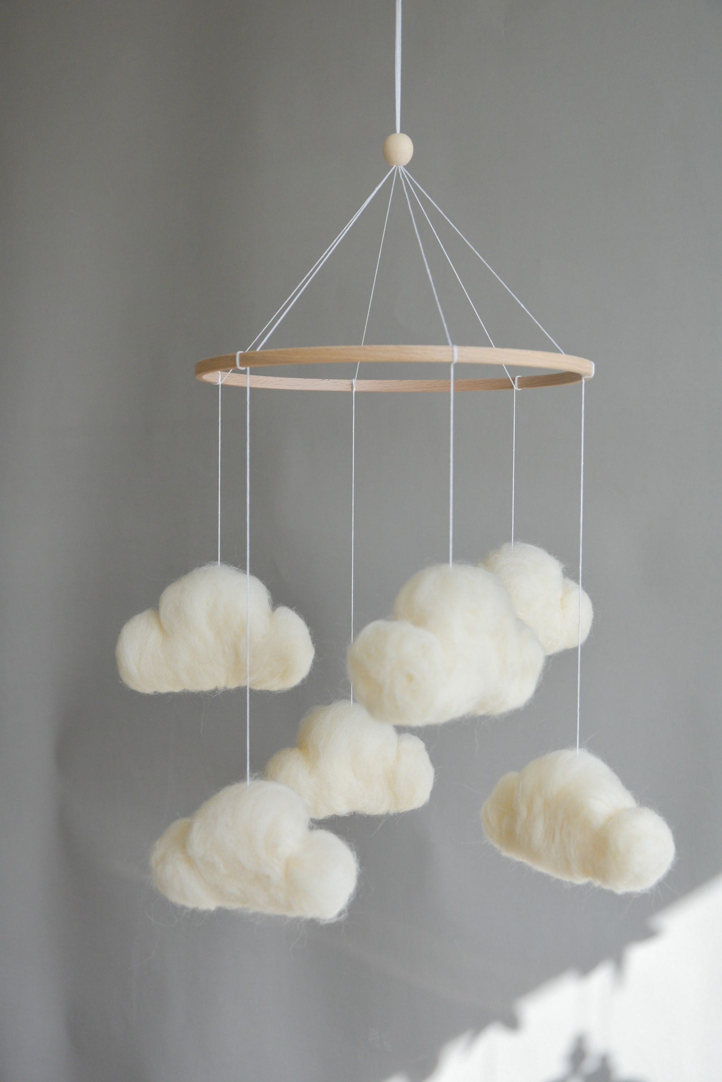 Felted cloud mobile